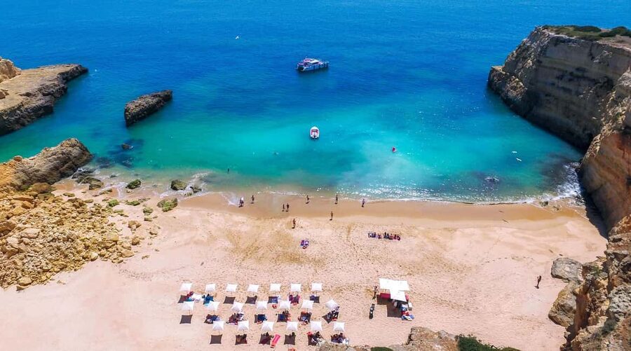 Albufeira: Sightseeing Cruise with Beach BBQ and Open Bar - Dinghy transfer to the private beach: why it feels different