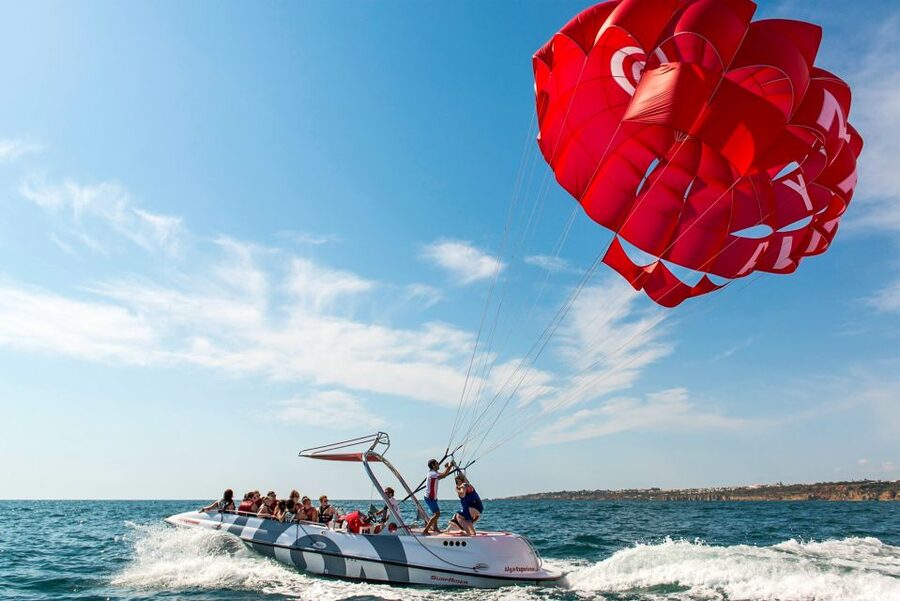 Albufeira: Single, Double or Triple Parasailing Tour - Where You Start: Marina Check-In and Getting on the Boat