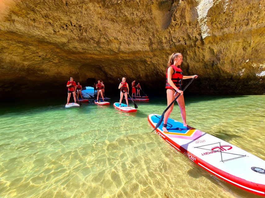 Albufeira: Stand Up Paddle Lesson and Coastal Tour - Getting set up: boards, life jackets, and the beginner rowing lesson