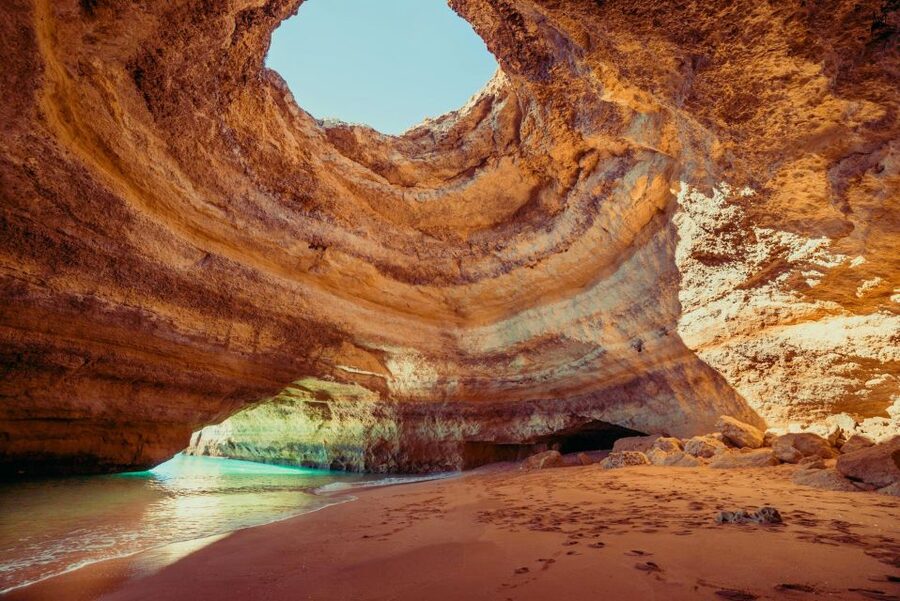 Benagil: Caves, Coves & Secret Beaches Guided Kayaking Tour - Benagil Sea Cave Stop: Sunlight, Multicolored Limestone, and Photo Timing