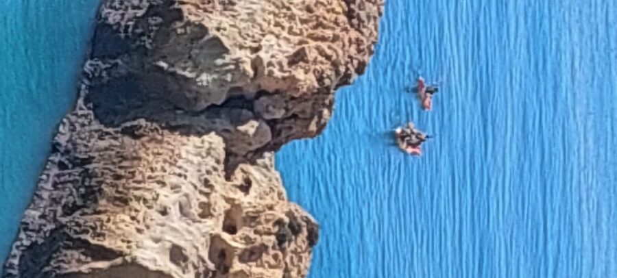 Benagil: Sunrise or Sunset Sea Kayak Tour - Entering Benagil Cathedral: the cave moment people come for