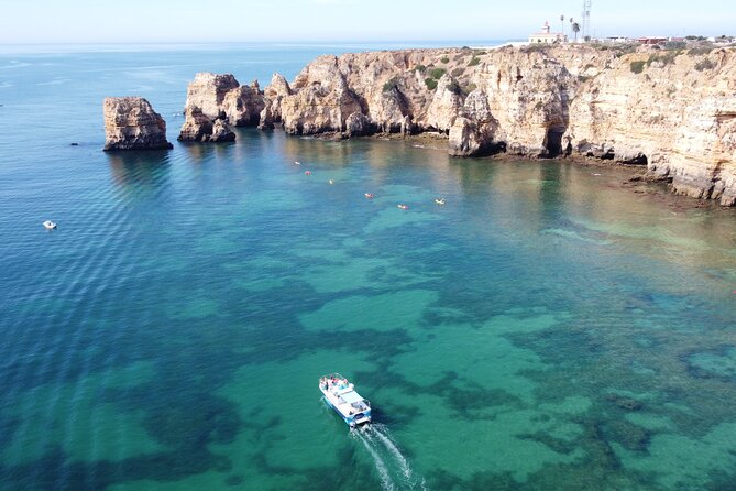 Coast Cruise Trip to Ponta da Piedade from Lagos - Onboard Comfort: Cushioned Seating, Bathroom, and a Bar