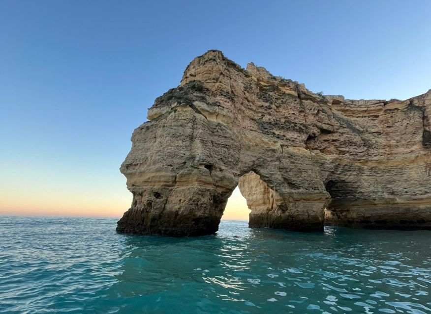 From Armação de Pêra: Sunset Benagil Caves Boat Tour - What to bring (and what the jacket solves)