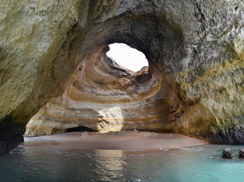 From Carvoeiro: Benagil Caves and Praia da Marinha Boat Trip - From Carvoeiro Beach Square to the cave mouths