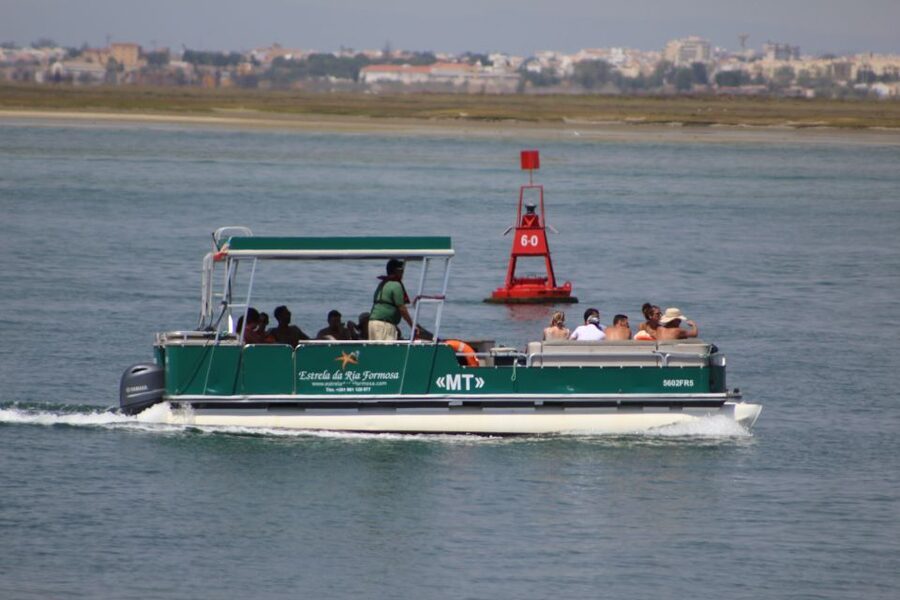 From Faro: 2-Island, 2-Stop Ria Formosa Catamaran Tour - Stop 2: Ilha do Farol for the lighthouse area and island life (about 45 minutes)