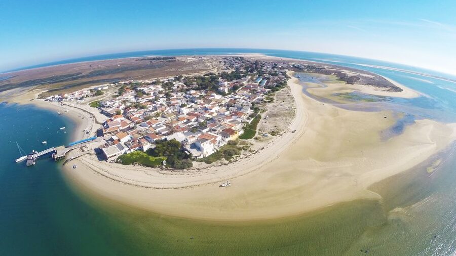 From Fuzeta: 2-Hour Southeast Ria Formosa Boat Trip - Armona Island: coffee, crystal water, and the quick-change reality
