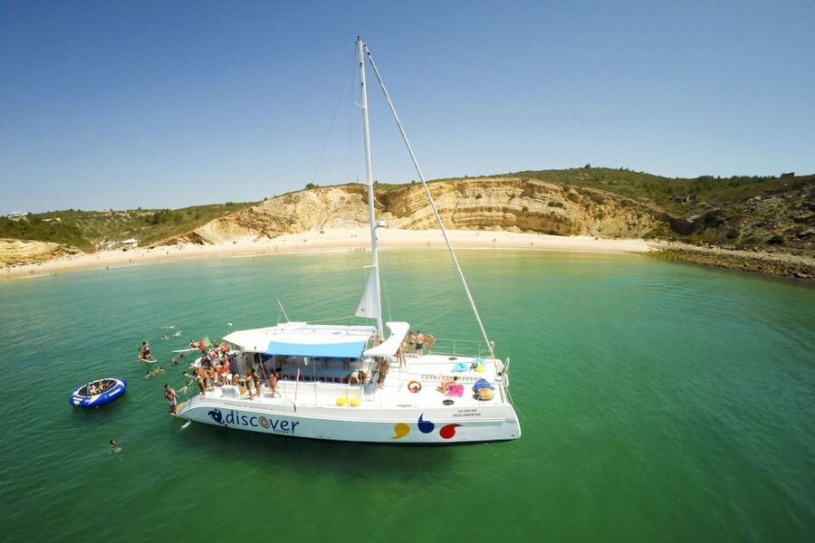 From Lagos: Algarve Cruise by Catamaran - Praia da Luz: a different mood after the dramatic cliffs