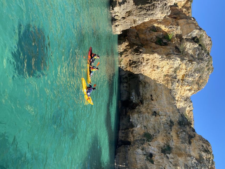 From Lagos: Kayak Experience in Ponta da Piedade - The guide and the support boat: safety without killing the fun
