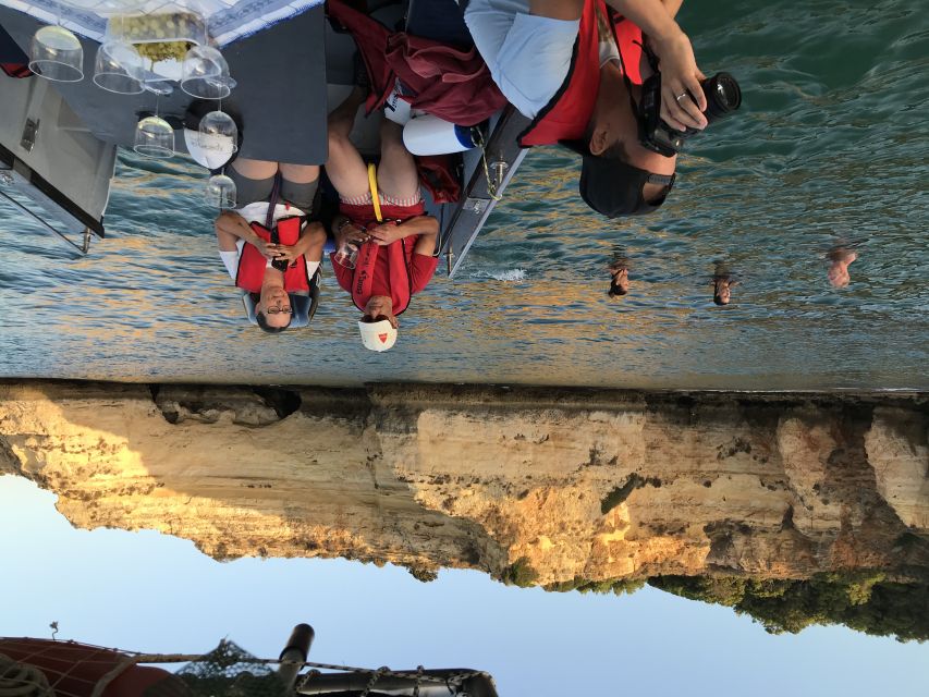 From Portimão: Sunset Boat Trip with Wine - A Portuguese Live Guide: The Hosting Makes the Difference