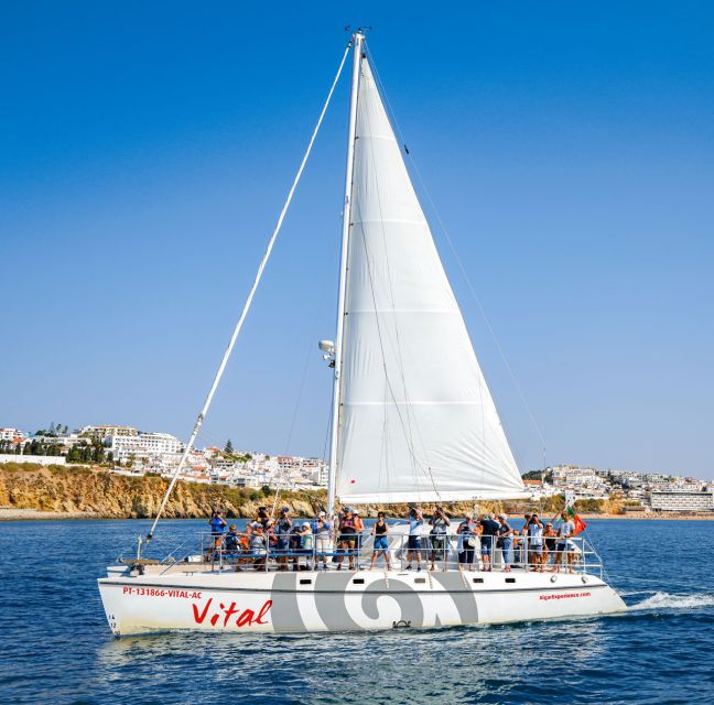 From Vilamoura: Sunset Catamaran Experience - On-Board Comfort: Lounge, Bar, WiFi, and Two Restrooms