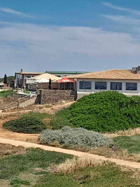 Full Day Algarvian West Coast Tour - Praia da Bordeira: big beach energy and surf at work