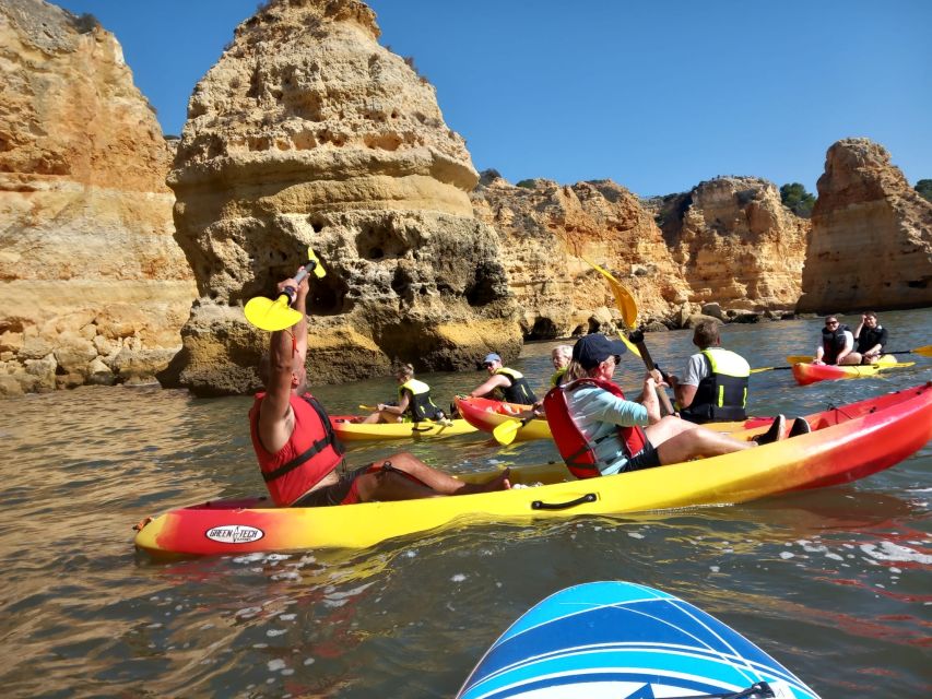 Lagoa: Benagil Cave and Marinha Beach Guided Kayaking Tour - Meeting point and how to spot your guide