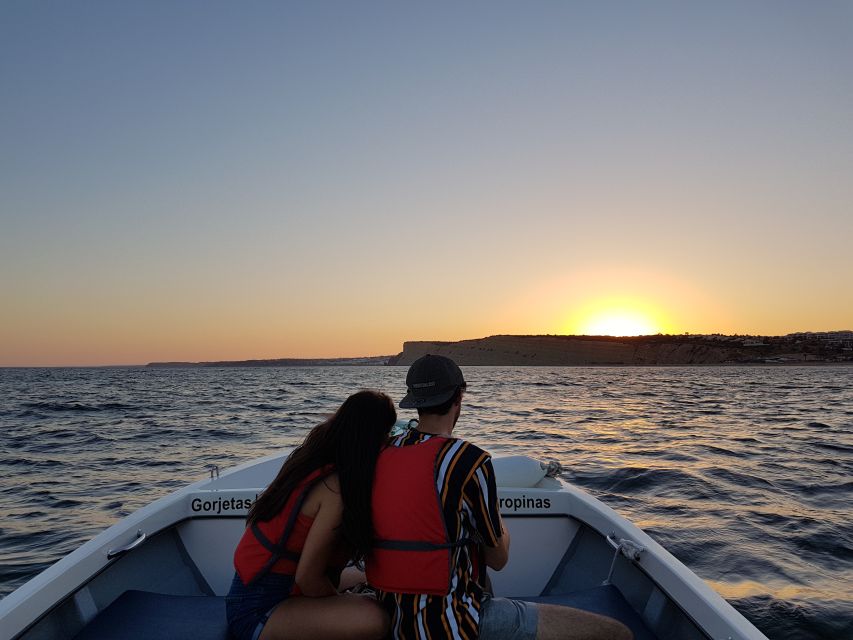 Lagos: Guided Ponta da Piedade Sunset Boat Tour - The lighthouse pass and the sunset colors moment