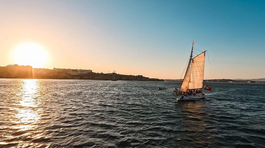 Lagos: Sunset Sail aboard a Traditional Boat with Prosecco - Crew Energy and Lagos Route Highlights (Including Grotto Moments)