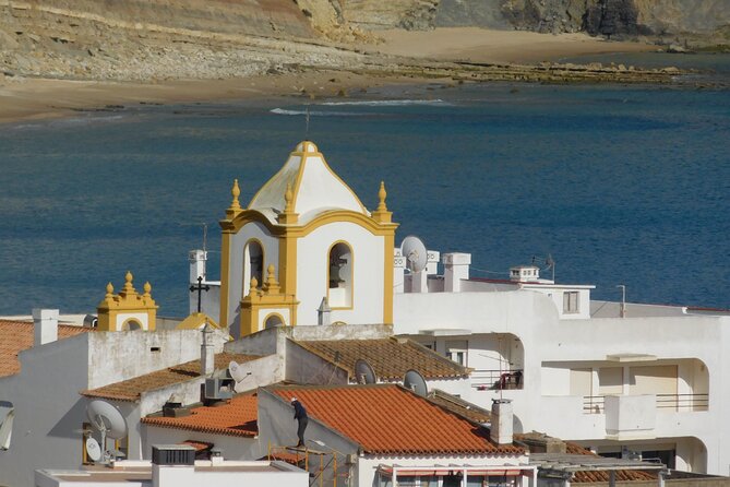 Lagos to Luz with an eco Tuk and local guide - Praia da Luz cliff stop: the best “wow” moment comes first