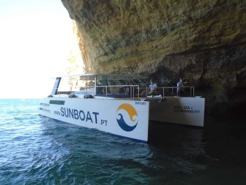 Portimão: Benagil Caves & Golden Coast Eco Catamaran Tour - Onboard Comfort: Shade, Bar, Deck, Restroom, and Music