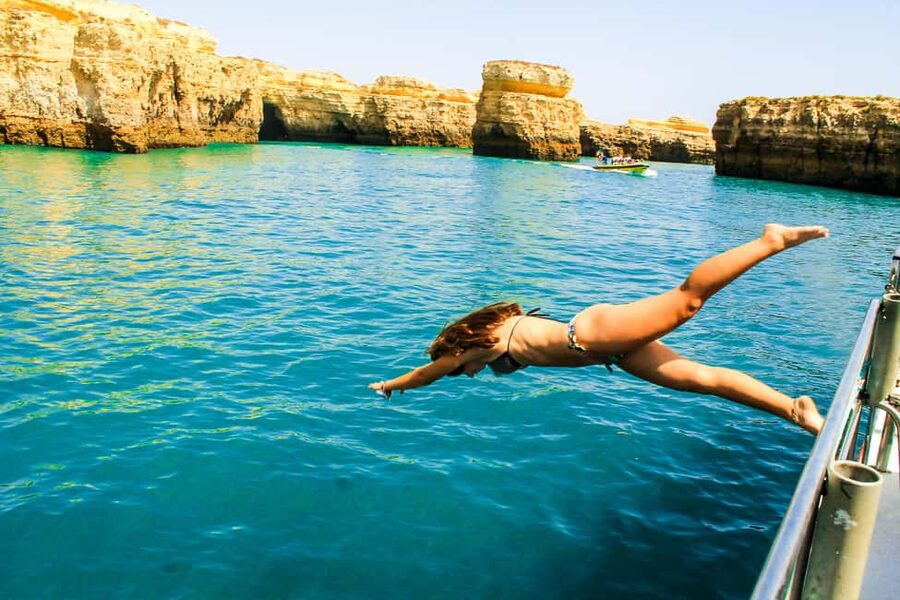 Quarteira: Benagil Cave Boat Trip with Beach BBQ and Kayak - Kayaks and paddle boards: when you get to do more than watch