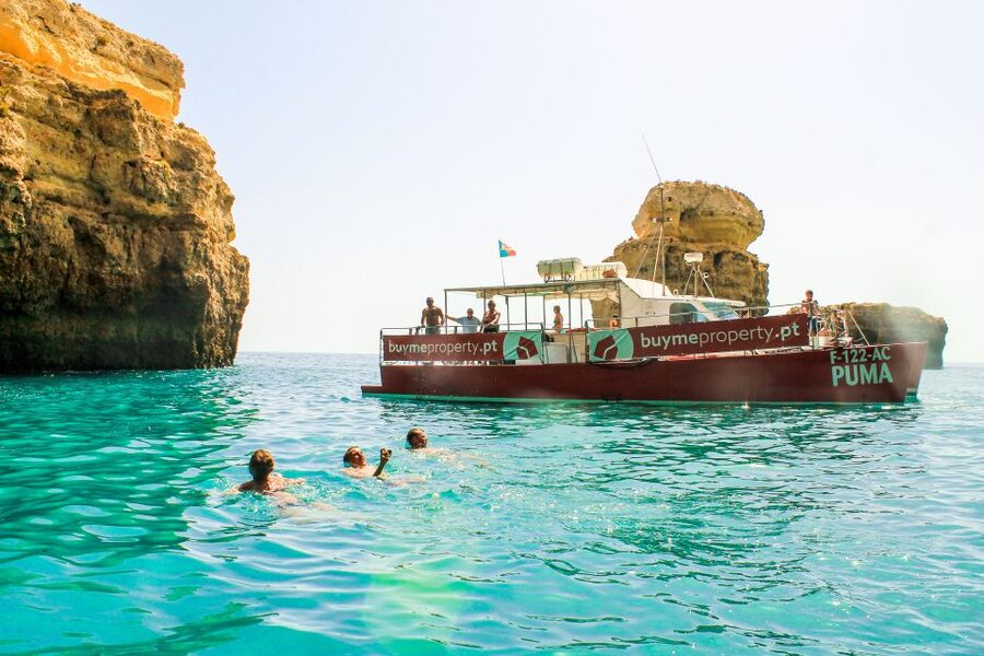Quarteira: Benagil Cave Guided Catamaran Day Cruise & Drink - Sailing the Algarve coast: caves, birds, and dolphins on the move