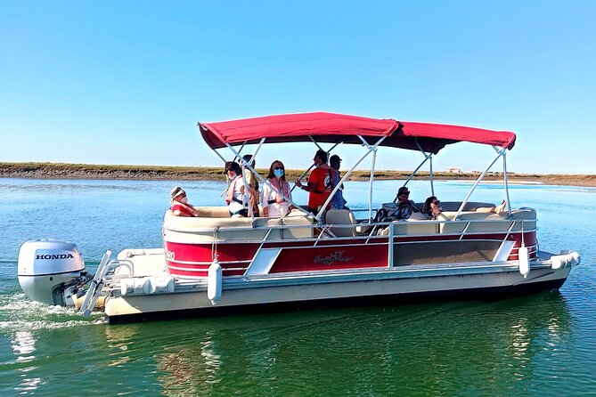Ria Formosa Sunset 1 hour Boat Trip in Faro - Onboard vibe: live commentary, multilingual guides, and small-group comfort